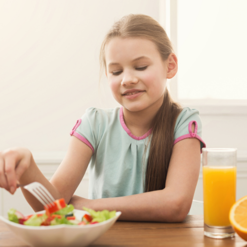 girl eating a salad